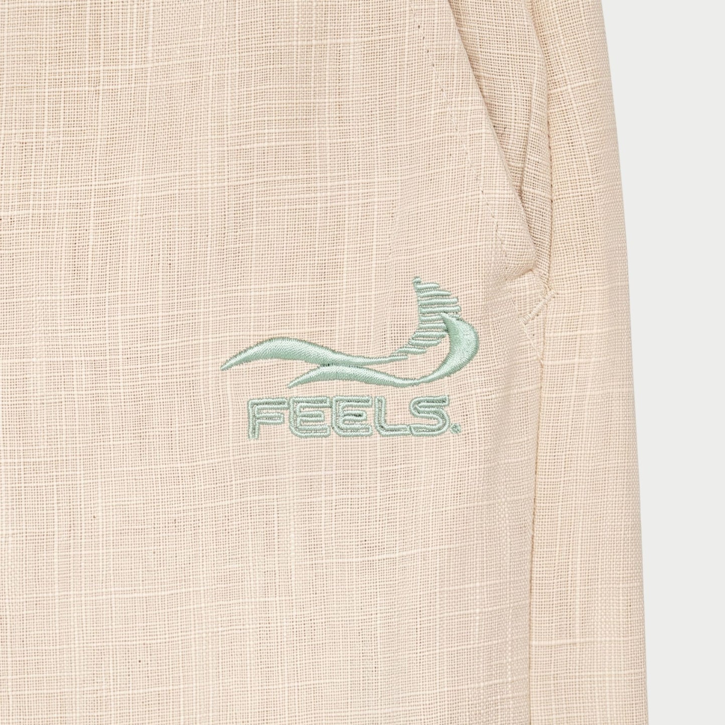 LINEN TWO-TUCKED SLACKS BEIGE